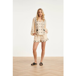 Smashed Lemon Off white blouse met zwarte borduursels en strikkoord |